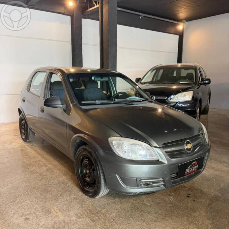 CHEVROLET - CELTA 1.0 MPFI VHCE SPIRIT 8V FLEX 4P MANUAL - 2010/2011 - VERDE - R$ 31.500,00