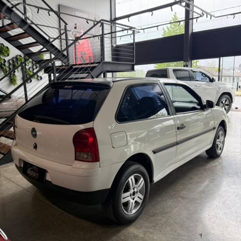 VOLKSWAGEN - GOL 1.0 MI 8V FLEX 2P MANUAL G.IV - 2007/2008 - BRANCA - R$ 22.900,00